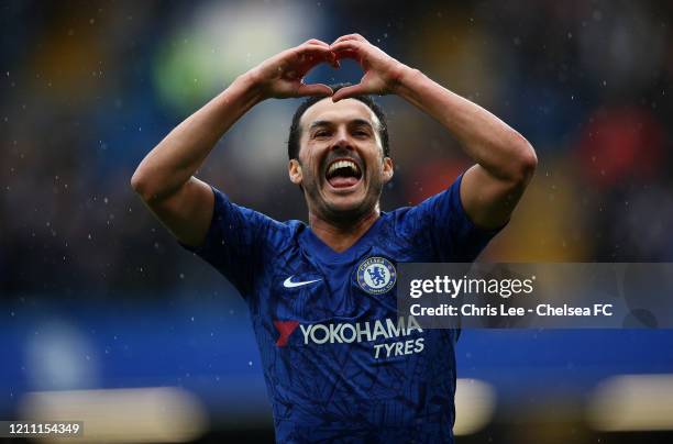 Pedro of Chelsea celebrates after scoring his team's second goal during the Premier League match between Chelsea FC and Everton FC at Stamford Bridge...