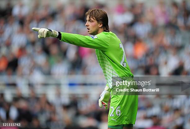 Goalkeeper Tim Krul of Newcastle United gives instructions during the Barclays Premier League match between Newcastle United and Arsenal at St James'...