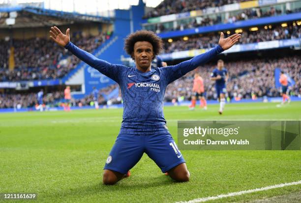Willian of Chelsea celebrates after scoring his team's third goal during the Premier League match between Chelsea FC and Everton FC at Stamford...