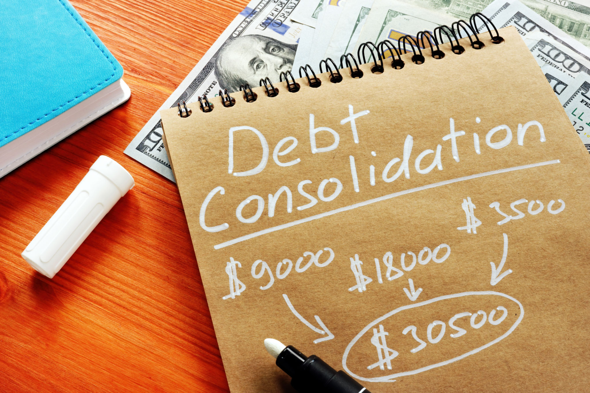 Debt consolidation title with written calculations. Debt consolidation title with written calculations.