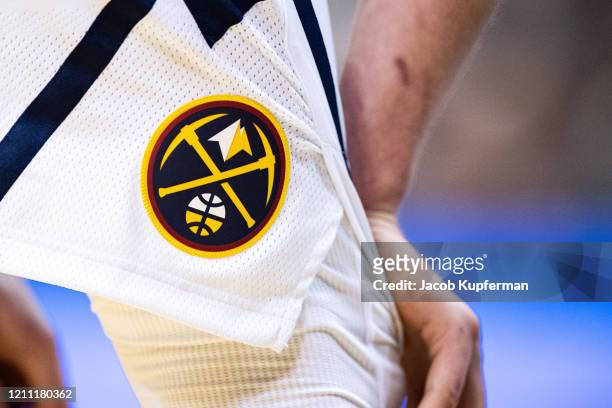 The Denver Nuggets logo on the shorts of Nikola Jokic of the Denver Nuggets during the fourth quarter during their game against the Charlotte Hornets...