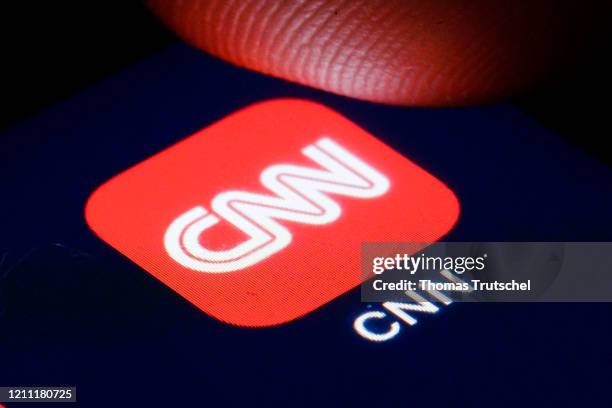 The logo of the US tv channel CNN is shown on the display of a smartphone on April 22, 2020 in Berlin, Germany.