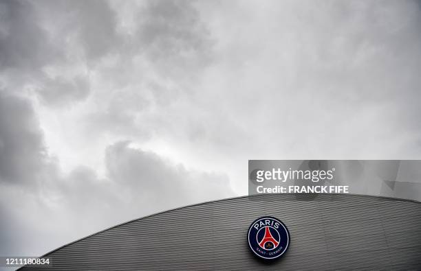 Photograph taken on April 28, 2020 shows the Paris-Saint-Germain logo on the roof of the Parc des Princes stadium in Paris on the 43rd day of a...