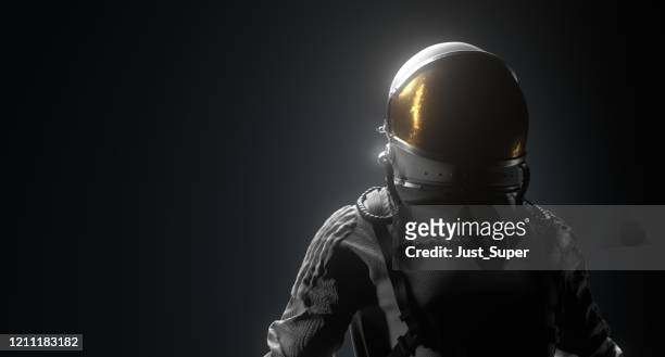 astronaut space schwarzer hintergrund - supermoon stock-fotos und bilder