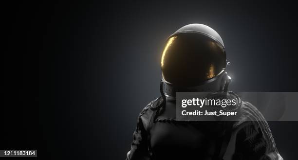 astronaut space black background - astronaut space suit stock pictures, royalty-free photos & images