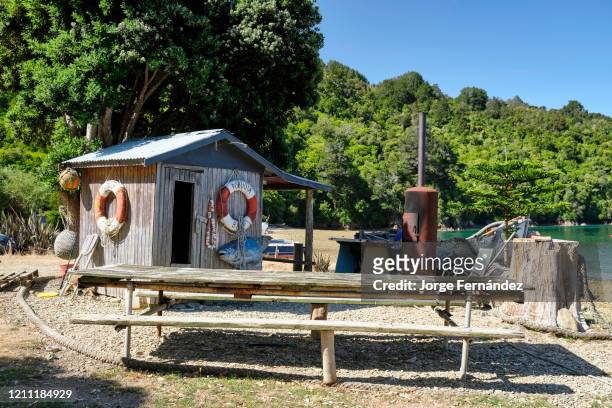 Small seaside fisherman's cabin in the village of Bulwer, Marlborough Sounds.