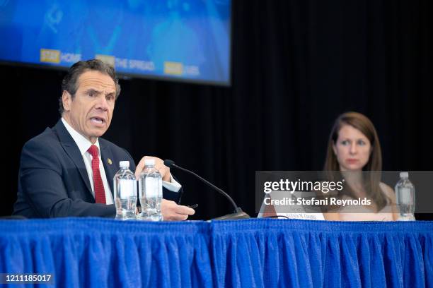 Melissa DeRosa, Secretary to the Governor, right, listens as New York State Governor Andrew Cuomo speaks during his daily Coronavirus press briefing...