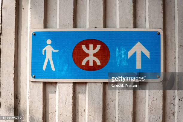 the sign of mtr metro station in hong kong - mtr logo stock pictures, royalty-free photos & images