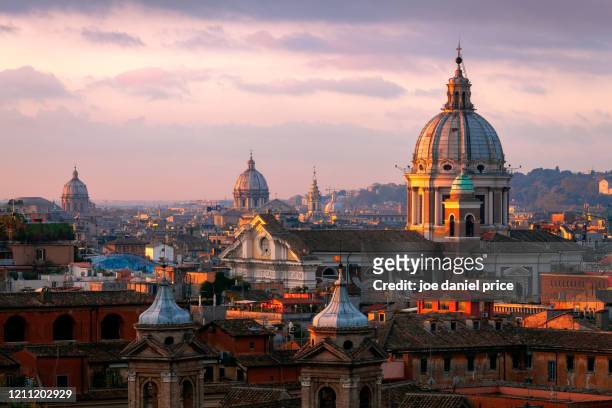 dusk, basilica of ss. ambrose and charles on the corso, rome, italy - rom stock-fotos und bilder
