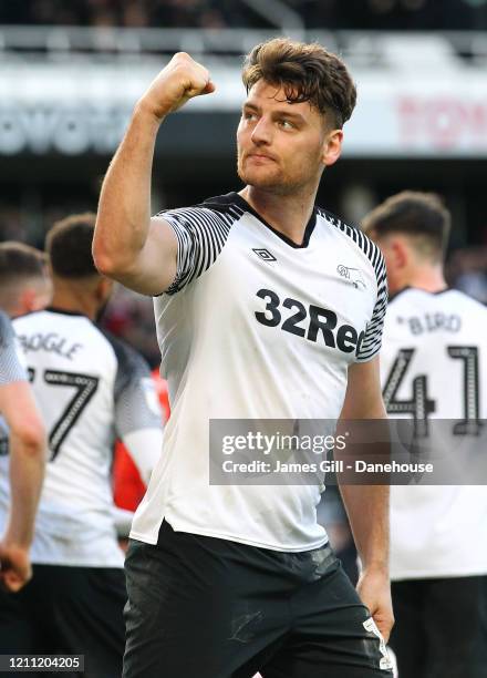 Chris Martin of Derby County celebrates after scoring their third goal from the penalty spot during the Sky Bet Championship match between Derby...