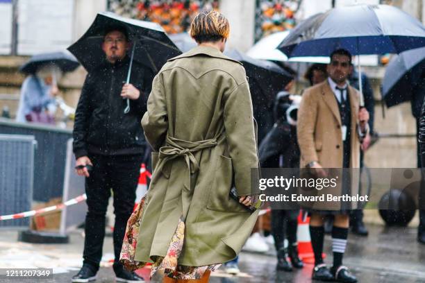 Yu Masui wears a green/khaki coat, during Paris Fashion Week - Womenswear Fall/Winter 2020/2021, on March 01, 2020 in Paris, France.