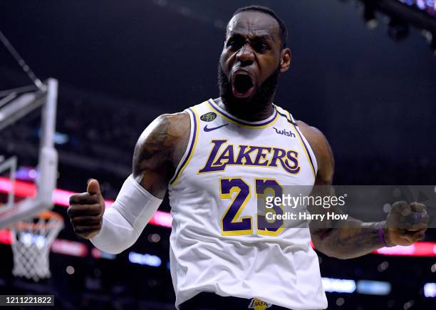 LeBron James of the Los Angeles Lakers celebrate his basket and LA Clippers foul during a 112-103 Lakers win at Staples Center on March 08, 2020 in...