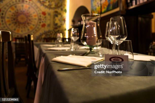 Inside the Borsieri Restaurant in Milan during the flash mob 'Risorgiamo Italia' where participating restaurants will raise the shutters to protest...