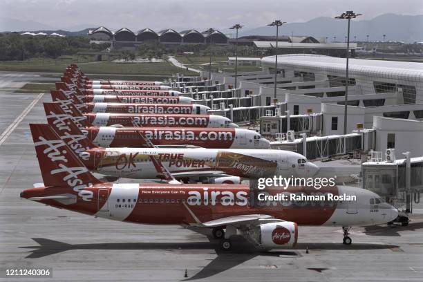 AirAsia aircrafts can be seen parked at the tarmac of Kuala Lumpur International Airport 2 on April 29, 2020 in Kuala Lumpur, Malaysia. AirAsia are...
