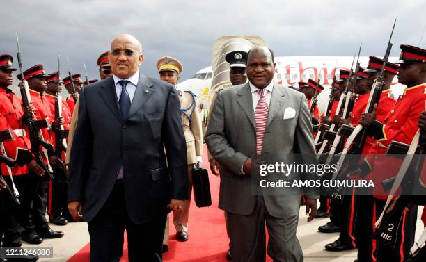 Djiboutis Prime Minister Dileta Muhammed Dileta and Malawis speaker of house for the Parliament, Henry Chimunthu Banda , review a guard of honour at...