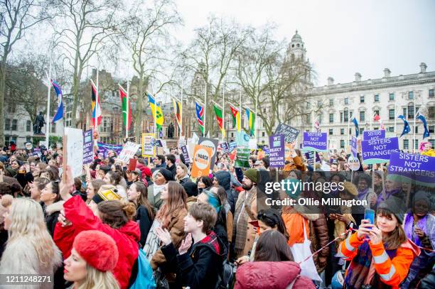 Demonstrators march down Whitehall to Parliament during the London #March4Women 2020 a part of International Women's Day on March 8, 2020 in London,...