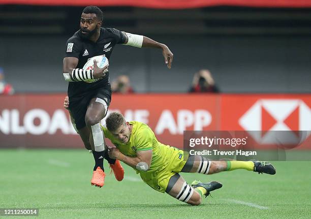 Joe Ravouvou of New Zealand evades Nick Malouf of Australia during the rugby sevens final at BC Place on March 08, 2020 in Vancouver, Canada.