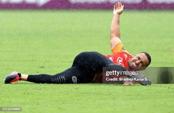 Jamil Hopoate stretches during a Brisbane Broncos NRL training session at Clive Berghofer Centre on March 09, 2020 in Brisbane, Australia.