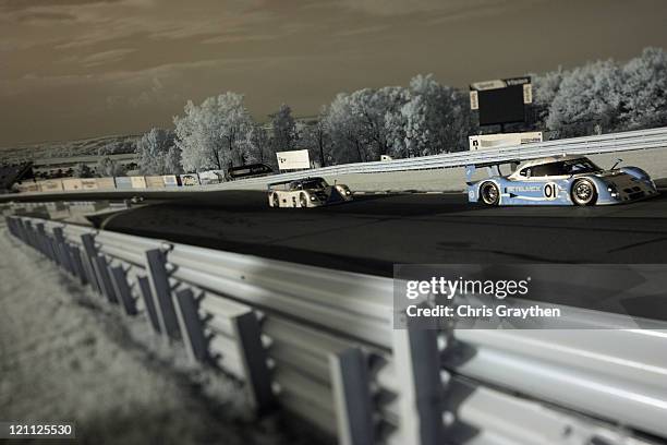 The TELMEX BMW Riley driven by Scott Pruett and Memo Rojas drives during the Grand-Am Rolex Sports Car Series Watkins Glen 200 at Watkins Glen...