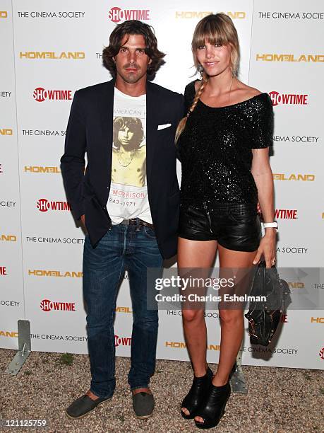 Polo player Nacho Figueras and wife Delfina Figueras attend the Showtime and The Cinema Society premiere of "Homeland" at a Private Residence on...