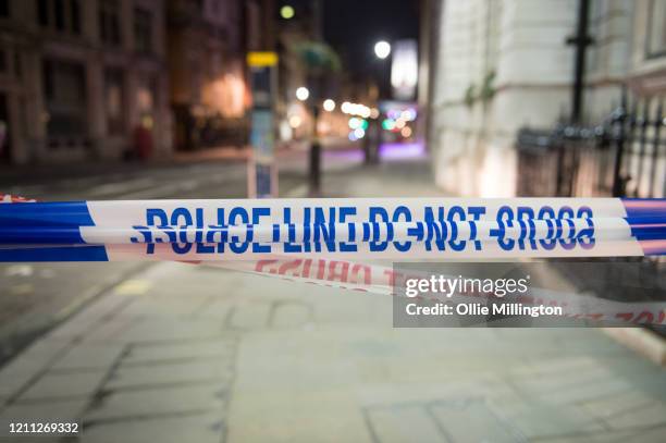 The cordon line of the scene where a man has been shot dead by police in whitehall overnight on March 9, 2020 in London, England. It has been...