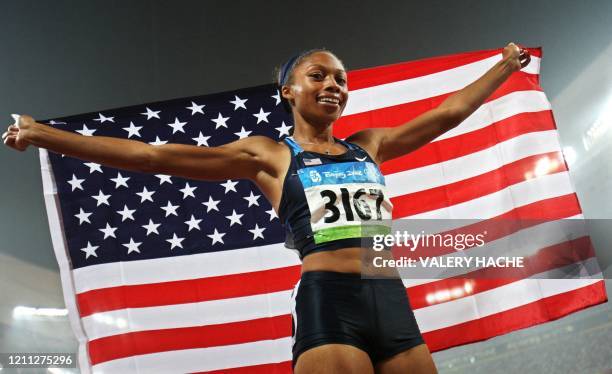 Allyson Felix of the US celebrates winning silver in the women's 200m final at the "Bird's Nest" National Stadium during the 2008 Beijing Olympic...