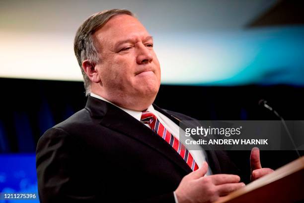 Secretary of State Mike Pompeo pauses while speaking at a news conference at the State Department on April 29 in Washington,DC.