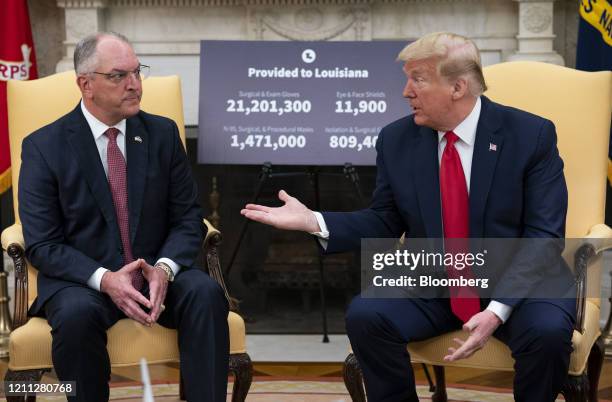 President Donald Trump speaks as John Bel Edwards, governor of Louisiana, left, listens during a meeting in Washington, D.C., U.S., on Wednesday,...