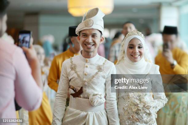 modern muslim bride and groom - muslim wedding stock pictures, royalty-free photos & images