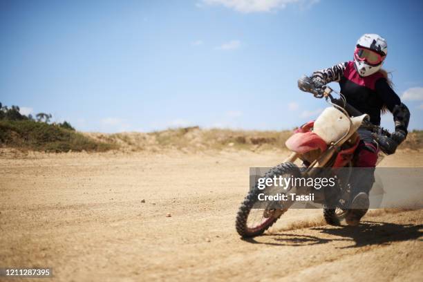 nobody knows control like a dirt biker - women motorsport stock pictures, royalty-free photos & images