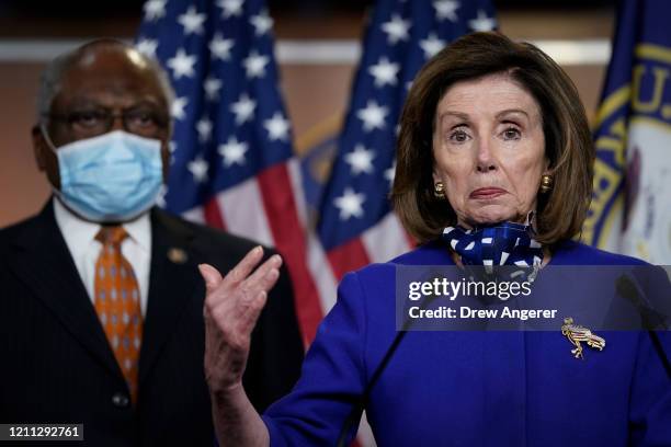 Rep. James Clyburn looks on as Speaker of the House Nancy Pelosi speaks during news conference at the U.S. Capitol, April 29, 2020 Washington, DC....