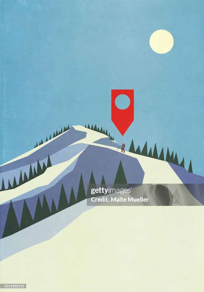 Map pin icon above person mountaineering on snowy mountain