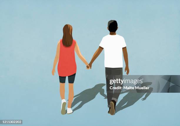 multiethnic couple holding hands and walking - holding hands illustration stock illustrations