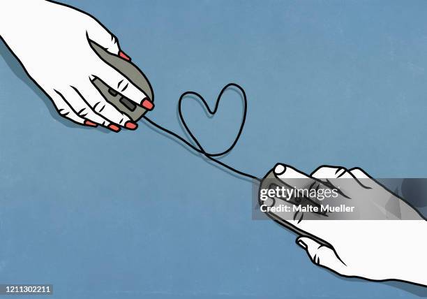 bildbanksillustrationer, clip art samt tecknat material och ikoner med heart shape forming between couple online dating - datorkabel