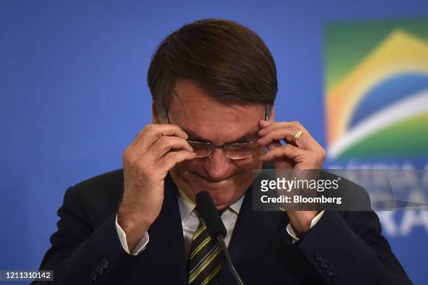 Jair Bolsonaro, Brazil's president, prepares to speak during an inauguration ceremony for Andre Mendonca, Brazil's new minister of justice, at...