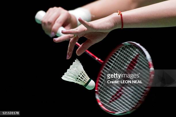 Close-up on the hands of Yu Yang of China as she serves to Tian Qing and Zhao Yunlei of China during the Finals of the women's doubles at the World...