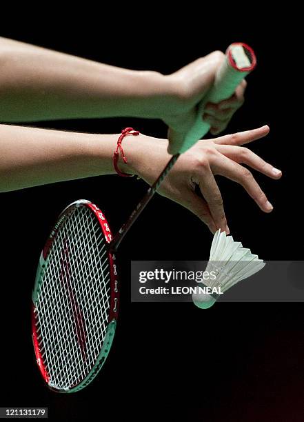 Close-up on the hands of Tian Qing of China as she serves a shot to Wang Xiaoli and Yu Yang of China during the Finals of the women's doubles at the...