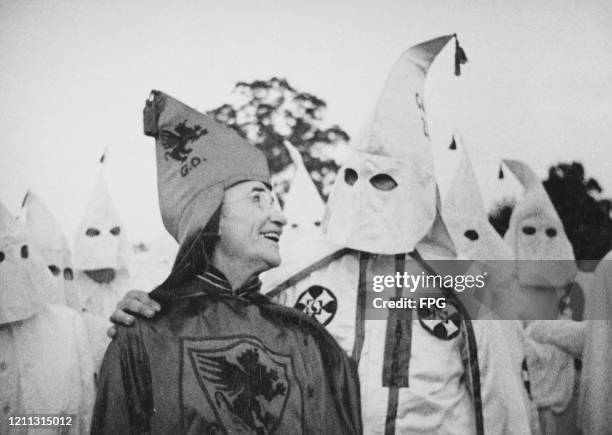 Samuel Green , Grand Dragon of the Ku Klux Klan, at an initiation ceremony with Klansmen at Stone Mountain, Georgia, US, July 1948.