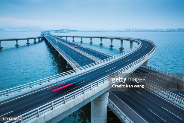 jiaozhou bay bridge of qingdao,shandong province,china - stock photo - suspension bridge stockfoto's en -beelden