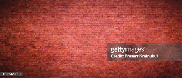 red brick wall background - brick wall stock pictures, royalty-free photos & images