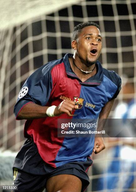 Patrick Kluivert celebrates a goal for Barcelona against Porto during the UEFA Champions League group A match at the Nou Camp in Barcelona, Spain....