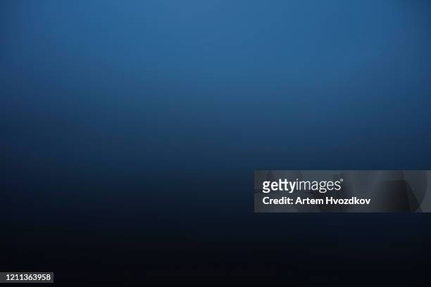 color gradient from medium blue to dark black - blue fog stock pictures, royalty-free photos & images