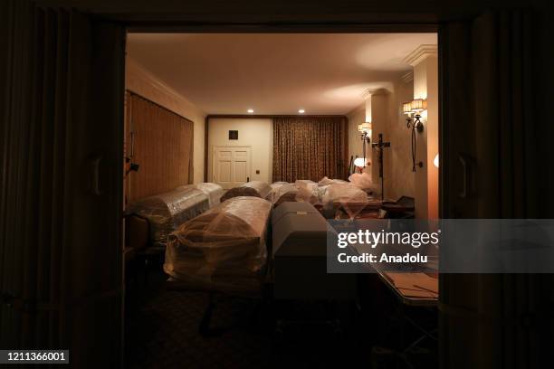 Caskets are seen with full of Covid-19 dead bodies at the Gerard J. Neufeld funeral home in Queens, New York City, United States on April 29, 2020....