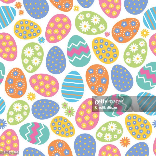 seamless pattern of easter eggs and flowers on white background. - easter border stock illustrations
