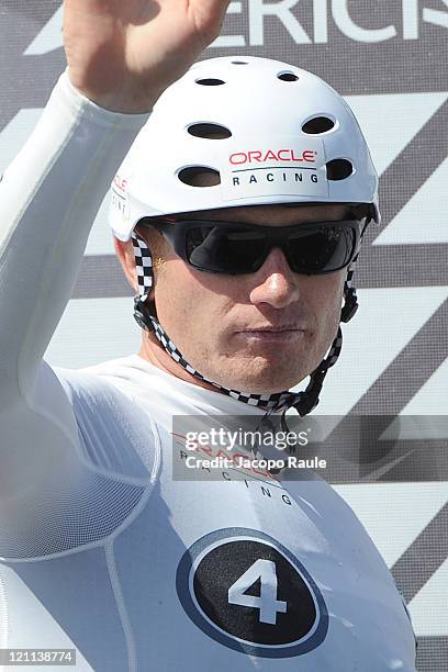 James Spithill stands on stage during the seventh day of America's Cup World Serieson August 14, 2011 in Cascais, Portugal.