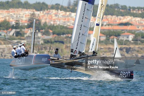 An AC45 catamaran of team Aleph competes in AC World Series Championship during seventh day of America's Cup World Series on August 14, 2011 in...