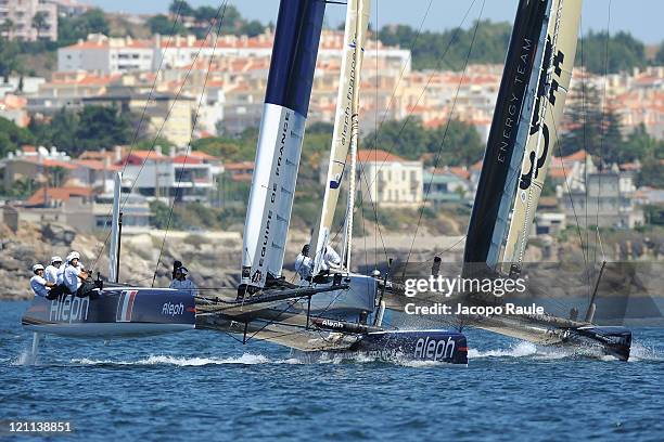 Two AC45 catamarans of team Aleph and Energy Team compete in the AC World Series Championship during the seventh day of America's Cup World Series on...