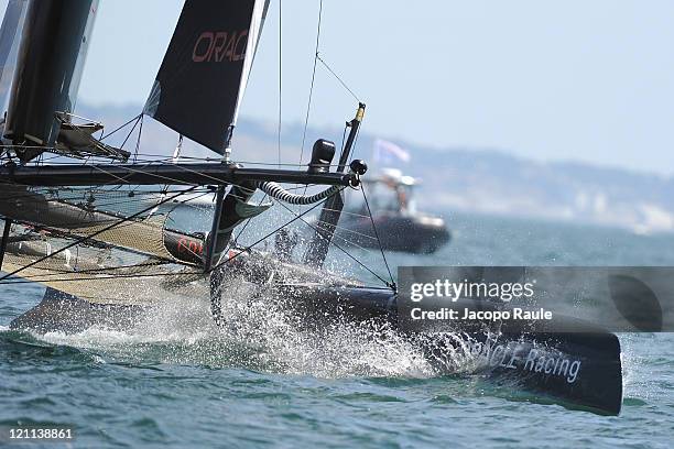 An AC45 catamaran of team Oracle Coutts competes in AC World Series Championship during seventh day of America's Cup World Series on August 14, 2011...