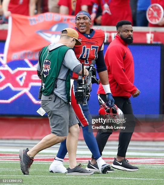 DeMarquis Gates of the Houston Roughnecks leaves the field after being injected for unsportsmanlike conduct against the Seattle Dragons during a XFL...