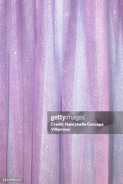 sheer tulle fabric in pink pastel colour - doorzichtige stof stockfoto's en -beelden